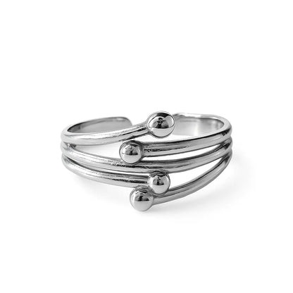 Bague spirale argentée triple courbe 3 billes acier 316L ajustable – Chéri Chérie