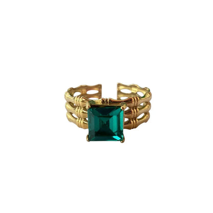 Bague Émeraude carrée Chéri Chérie: Bague émeraude carrée dorée solitaire vert anneau ajouré acier 316L ajustable – Chéri Chérie